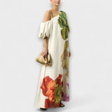 Skylar - Maxikleed met bloemenprint, schuin decolleté en puffmouwen