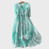Turquoise jurk met schildpadpatroon