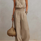 Ainara™ | Elegante Jumpsuit met Halterhals en Wijde Pijpen