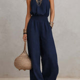 Ainara™ | Elegante Jumpsuit met Halterhals en Wijde Pijpen