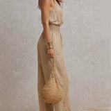 Ainara™ | Elegante Jumpsuit met Halterhals en Wijde Pijpen