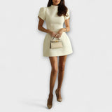 Lily - Mini-jurk met ruguitsnijding, strik en korte mouwen