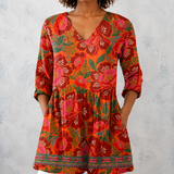 Marion | Lange blouse van linnen met grote folkloristische bloemen en geweven zoom