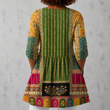 Émilie | Lange blouse van linnen met bohemian patchworkpatroon en versierde randen