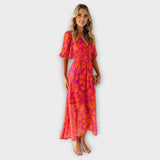 Katty – Midi-jurk met V-hals, bloemenpatroon en pofmouwen