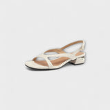 Evelyn - Elegante Platte Sandalen Minna met Verfijnd Afwerking