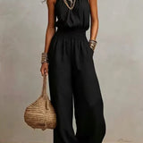 Ainara™ | Elegante Jumpsuit met Halterhals en Wijde Pijpen