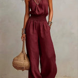 Ainara™ | Elegante Jumpsuit met Halterhals en Wijde Pijpen