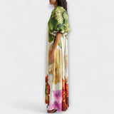 Skylar - Maxikleed met bloemenprint, schuin decolleté en puffmouwen