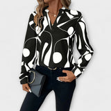 Edith - Elegante langärmelige blouse met spitse halslijn