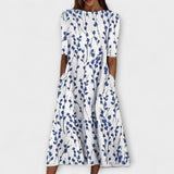 Adelina | Jurk met bloemen takken-print en A-lijn