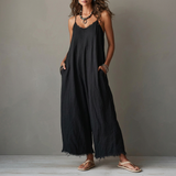 Inés™ | Ruimvallende Zwarte Jumpsuit met Wijde Pijpen en Zakken