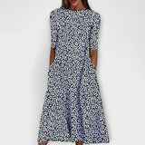 Adelina | Jurk met bloemen takken-print en A-lijn